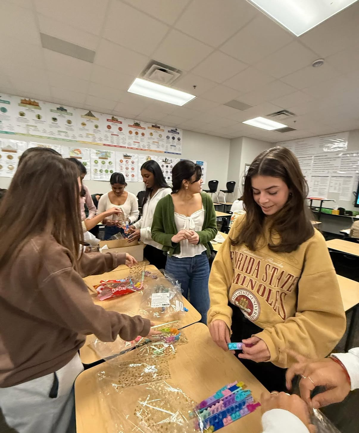 AIM volunteers leading craft activities