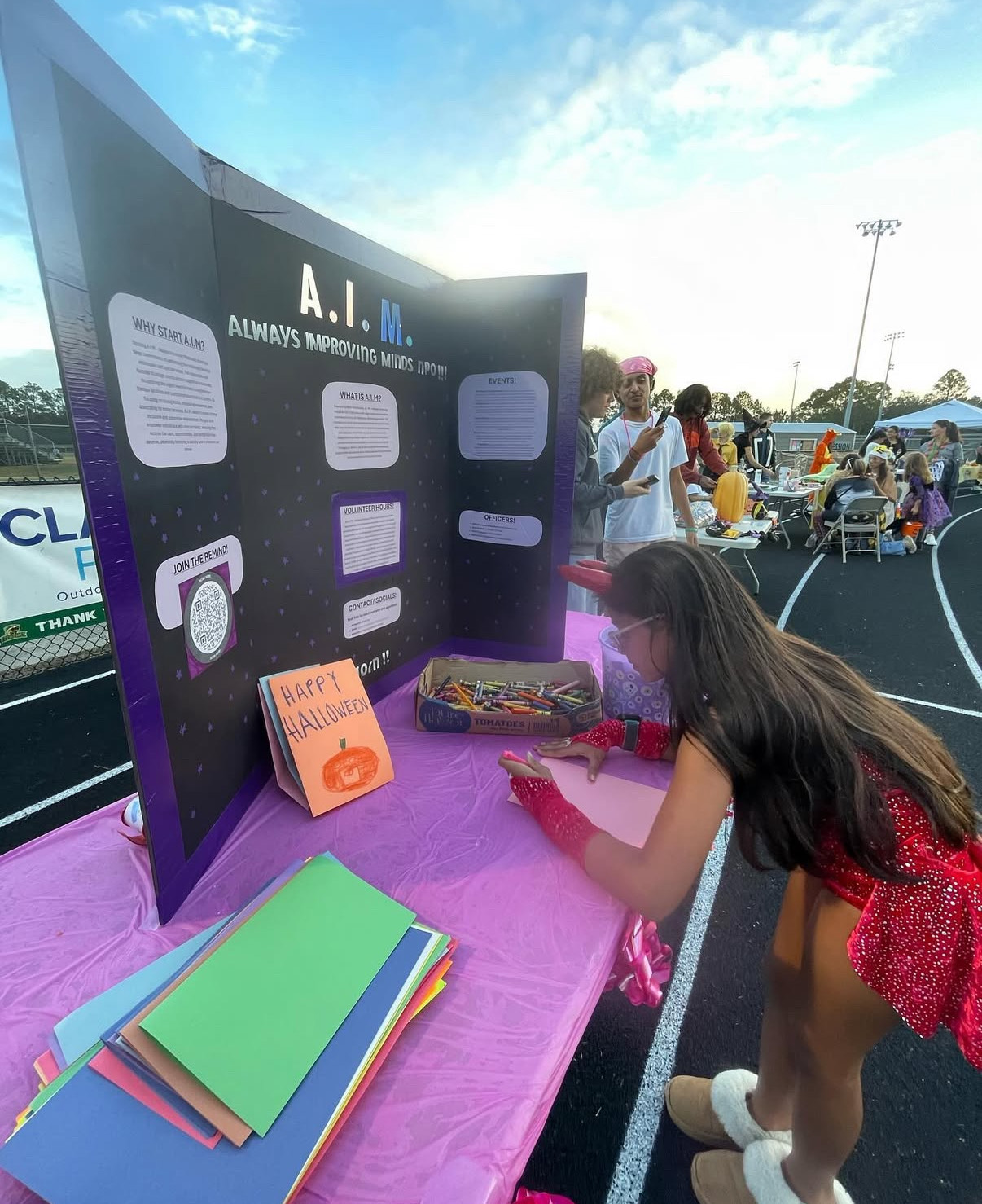 AIM volunteers at community information booth showcasing our nationwide reach